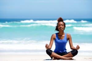 meditating on the beach